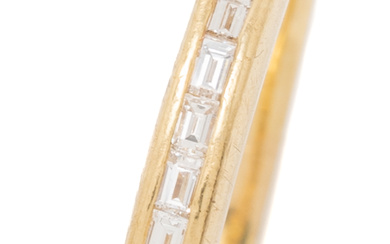 AN 18CT GOLD HALF HOOP DIAMOND RING; 2.4mm wide band...