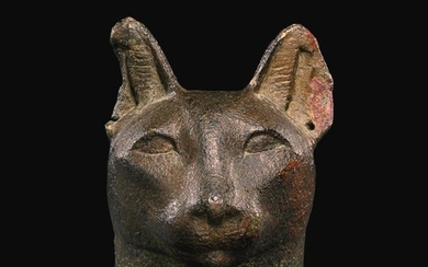AN EGYPTIAN BRONZE HEAD OF A CAT, 26TH/30TH DYNASTY, 664-342 B.C.