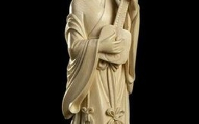 AN IVORY FEMALE FIGURE WITH AN INSTRUMENT China, early