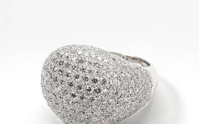 An 18 carat white gold and diamond dome...