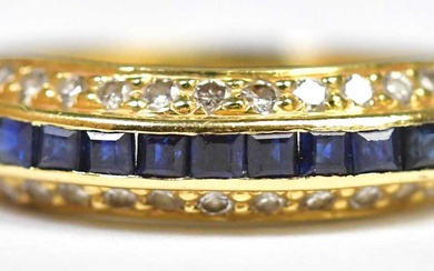 An 18ct gold diamond and sapphire ring, the four central...