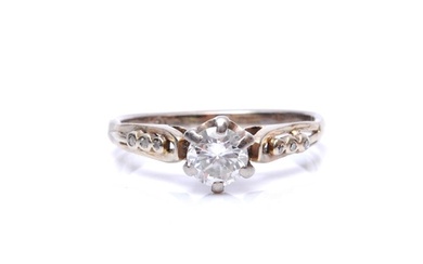 An 18ct white gold diamond solitaire ring, claw set brillian...