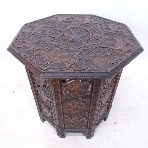 An Anglo-Indian octagonal hardwood occasional table, on fold...