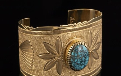 An Isaac Dial Yellow Gold and Lone Mountain Turquoise