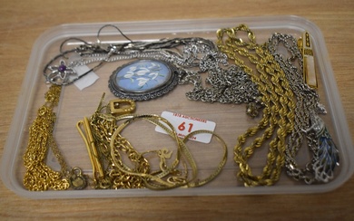 An assortment of costume jewellery including an enamelled and marcasite set peacock brooch, a set of