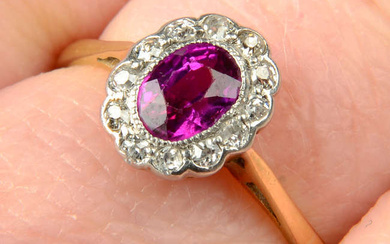 An early 20th century 18ct gold ruby and single-cut diamond cluster ring.
