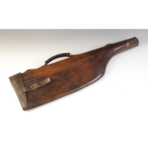 An early 20th century leg of mutton leather gun case, applie...