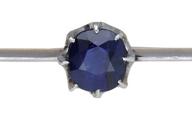 An early 20th century sapphire bar brooch, set with a cushion-shaped sapphire...