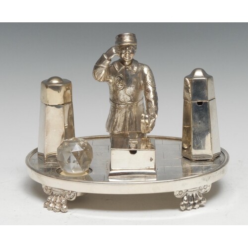 An early 20th century silver plated novelty cruet, as a shoe...