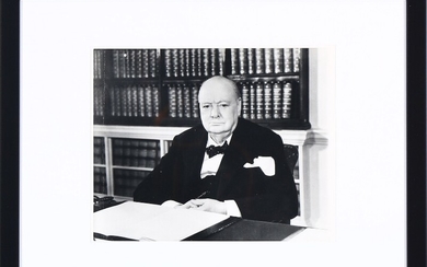 An original English black-and-white press photograph of Winston Churchill (1874–1965) in The Cabinet Room in Downing Street 10. Ca. 1940.