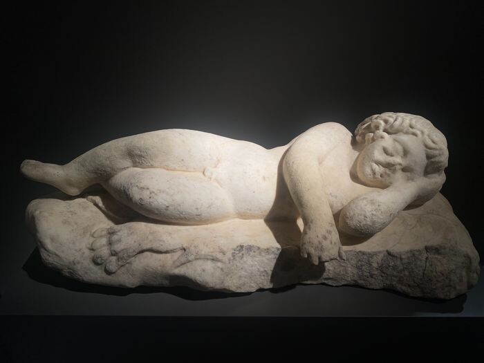 Ancient Roman Marble Huge sculpture of the god of love Eros sleeping with his bow. 60 cm L.
