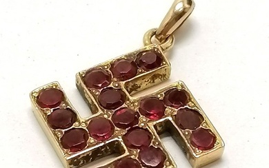 Antique unmarked gold swastika pendant set with rubies - 2cm...