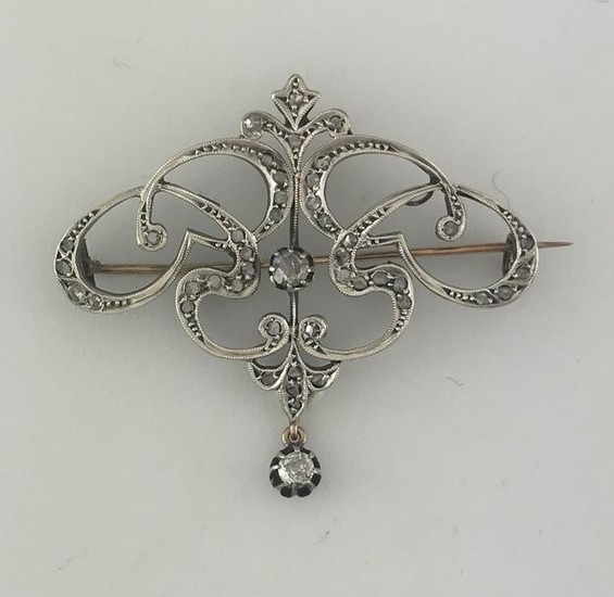 Arabesque brooch in gold 750°/°°° set with roses...