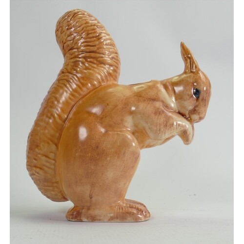 Beswick Ware early seated squirrel: in beige colours, h 22.5...