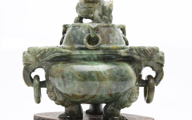 CHINESE SCHOOL, THIRD QUARTER OF THE 20TH CENTURY. Carved jade jar.