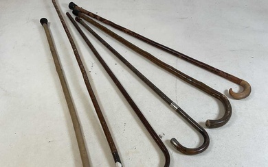 Collection of wooden walking sticks to include silver topped example,...