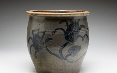DECORATED STONEWARE CROCK WITH FREEHAND STYLIZED FLOWERS AND VINE.