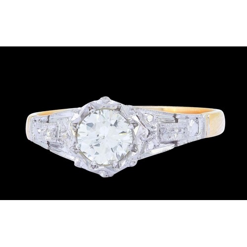 DIAMOND DRESS RING, in 18-ct gold and platinum. Set with a c...