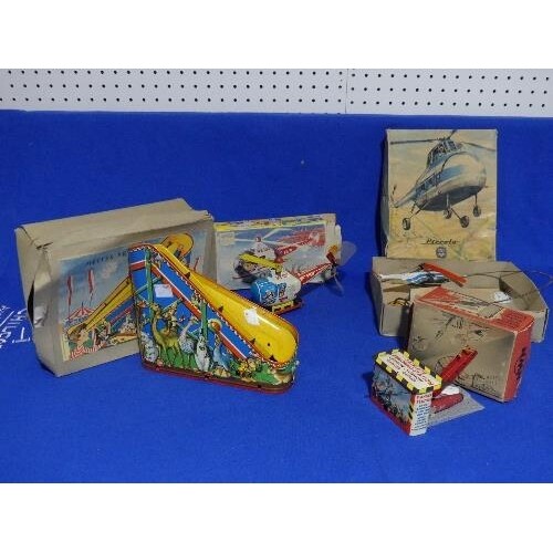 Four vintage 'Western Germany' tinplate toys, all boxed, inc...
