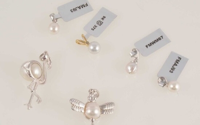 Gemporia - Seven South Sea cultured pearl pendants.
