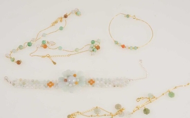Gemporia - Seven items of jadeite-set jewellery.