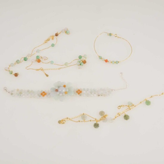 Gemporia - Seven items of jadeite-set jewellery.