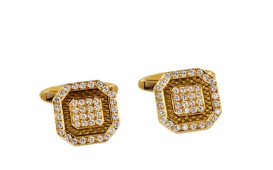 Gold Chopard cufflinks with guilloche and diamonds.