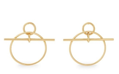 Hermes - a pair of 18ct gold earrings.