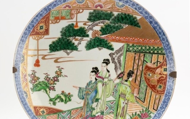 JAPANESE KO-IMARI PORCELAIN CHARGER With gilt-highlighted central decoration of three ladies in a courtyard surrounded by chrysanthe...