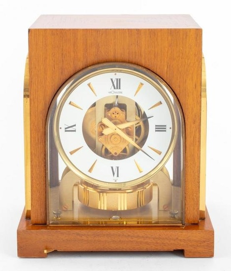 Jaeger-LeCoultre Atmos clock in mahogany wood case with gold-tone metal hardware, the dial marked