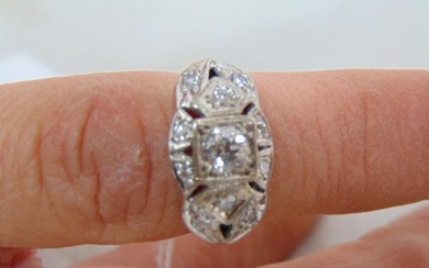 Jewelry. 14kt Vintage Diamond ring; white gold diamond ring; central round set diamond in square