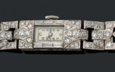 LADIES' WATCH Round diamonds and baguettes, 18k gold...