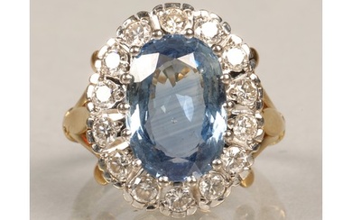 Ladies blue topaz and diamond ring, Central stone surrounded...