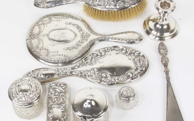 Lot details A collection of silver clad dressing table items,...