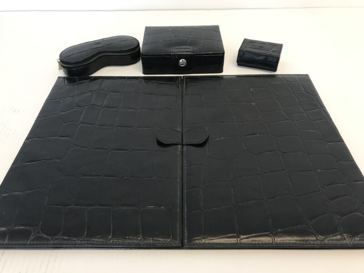 Mulberry: A collection comprising of a jewellery box, a box, a glasses case and a foldable writing pad made of black croc embossed leather. (4)