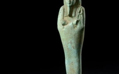 Mummiform Uzhebti wearing a tripartite