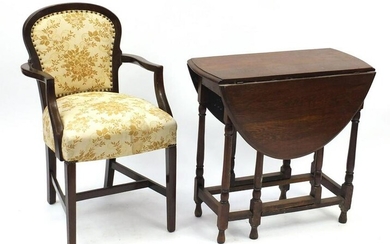 Oak drop-leaf table and open armchair with floral