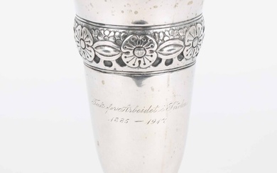 Ornamental silver vase, decorated with flowers and stylized foliage, early 20th century