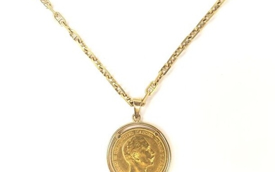 PENDANTIF in gold 750 ‰, (pds 10,3 g) decorated with a 20 mark coin with its suspension chain, (pds 29,3 g)