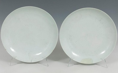 Pair of dishes; China, late 19th century. Porcelain following qingbai models. One of them has a hair