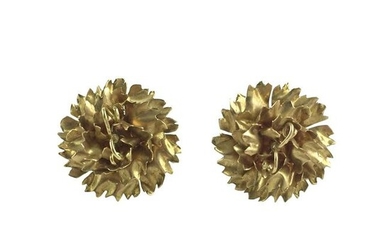 Pair of rosettes in 18 K yellow gold.