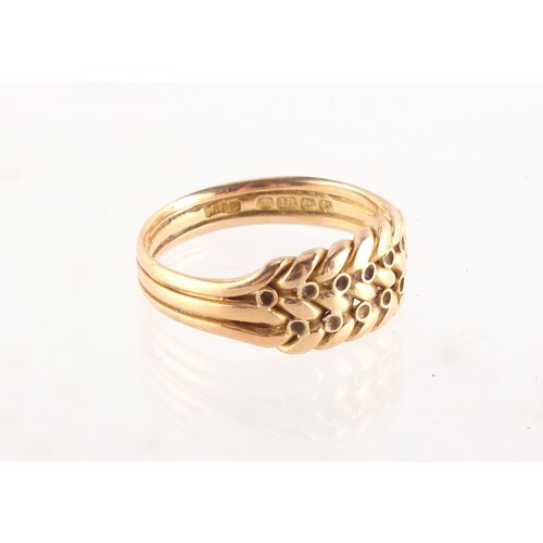 Property of a deceased estate - an 18ct gold ring of braided...