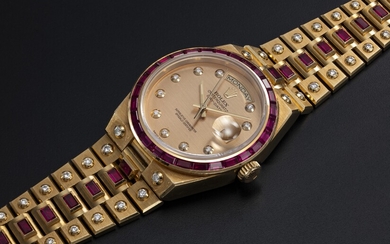 ROLEX "PAC-MAN" REF. 19168, A RARE GOLD OYSTERQUARTZ DAY-DATE, DIAMOND AND RUBY-SET WRISTWATCH AND BRACELET