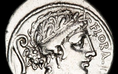 Roman Republic. C. Servilius C.f., 57 BC. AR Denarius,Flora bust right wearing wreath of flowers; FLORAL PRIMVS / two warriors