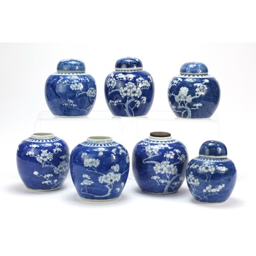 Seven Chinese blue and white prunus pattern porcelain ginger...