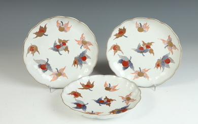 THREE JAPANESE ARITAWARE PORCELAIN PLATES WITH LARGE SCATTERED POLYCHROME BLOSSOM...