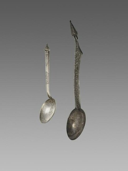 TWO LARGE CAMBODIAN SILVER SPOONS