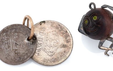TWO VINTAGE SILVER CHARMS; WWI 'Touch Wud' silver and wood lucky charm and two silver coins, an 1870 three-pence and 1867 50 cents,...