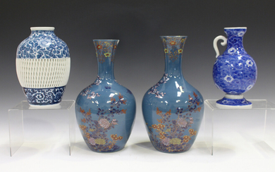 Two Japanese Koransha porcelain vases, Meiji period, each ovoid body and trumpet neck painted in gil