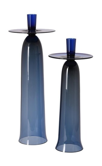 λ Two graduated glass tall candlesticks by Anna Torfs